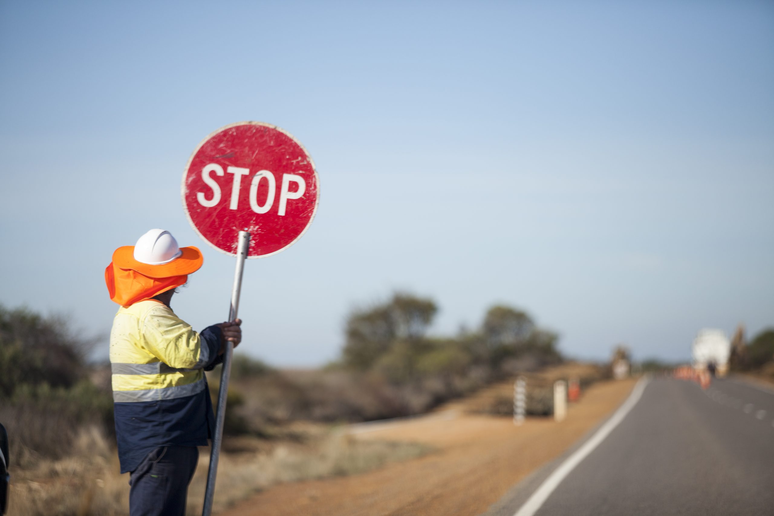 The Worker Construction Hand Hold Circle Red Road Stop Sign